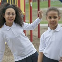 Montessori School House Embroidered Long Sleeve Polo